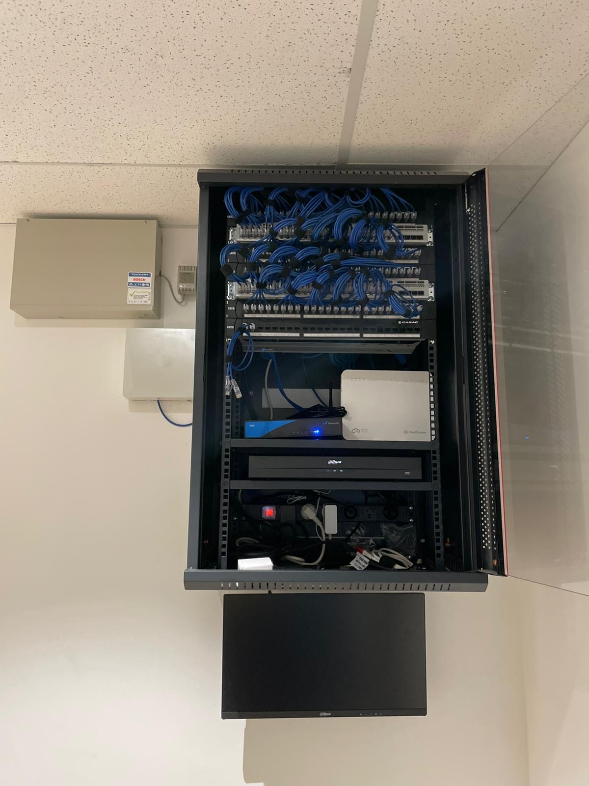 CAT6 patch panel — every port labelled and tested